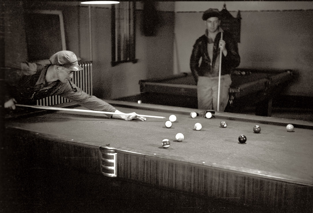 May 1940. A friendly game in a Scranton, Iowa, poolroom. View full size. 35mm nitrate negative by John Vachon for the Farm Security Administration.
