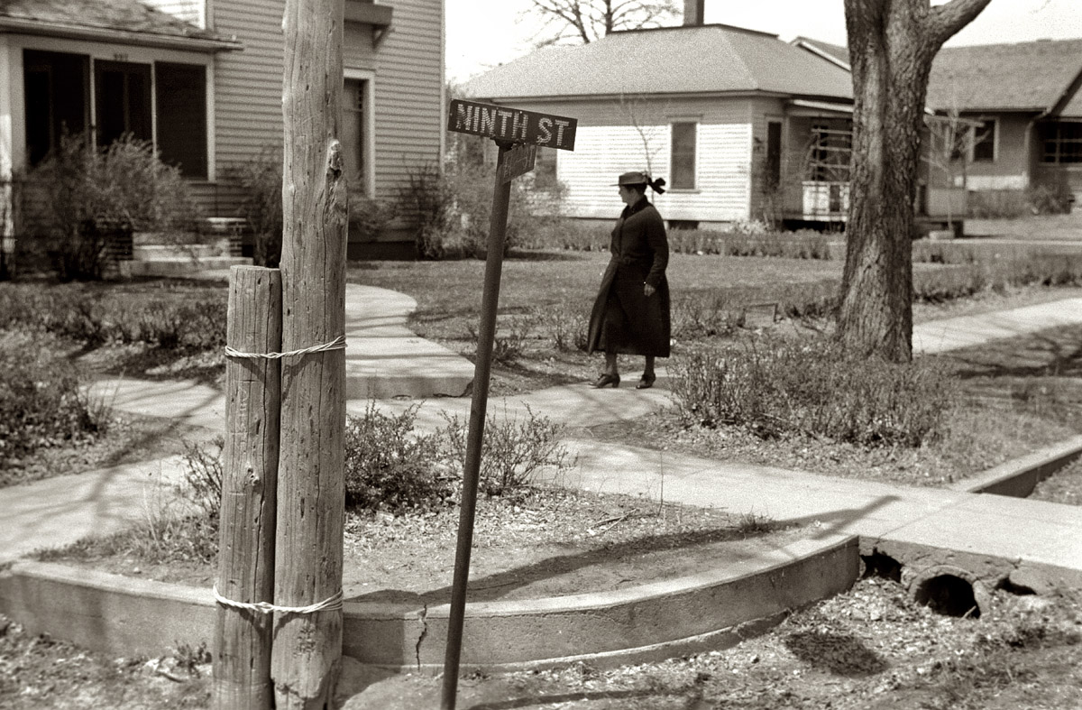 May 1940. "Residential street in Woodbine, Iowa." View full size. 35mm nitrate negative by John Vachon for the Farm Security Administration.