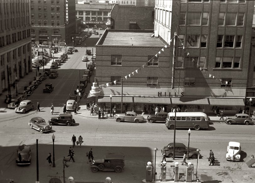 May 1940. Business district and gas station in Des Moines, Iowa. View full size. 35mm nitrate negative by John Vachon for the Farm Security Administration.