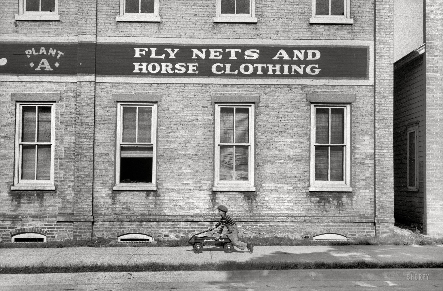 July 1940. "Manitowoc, Wisconsin." Hub of the fly-net industry. 35mm nitrate negative by John Vachon for the Farm Security Administration. View full size. 