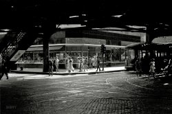July 1940. "Under the elevated railway, Chicago, Illinois." 35mm nitrate negative by John Vachon for the Resettlement Administration. View full size.