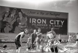 A homemade swimming pool for steelworkers' children in Pittsburgh, Pennsylvania. Photograph by Arthur Rothstein, July, 1938. View full size.

