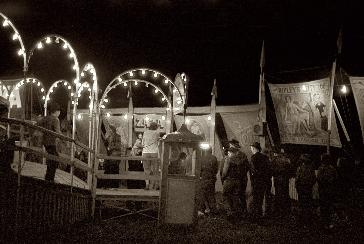 Summer 1939. Carnival at Bozeman, Montana. View full size. 35mm nitrate negative by Arthur Rothstein for the Farm Security Administration.
