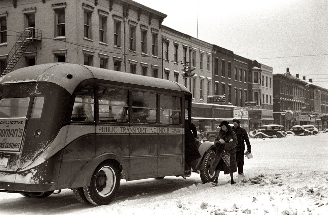 February 1940. Getting on the bus during a snowstorm in Chillicothe, Ohio. 35mm nitrate negative by Arthur Rothstein for the FSA. View full size.