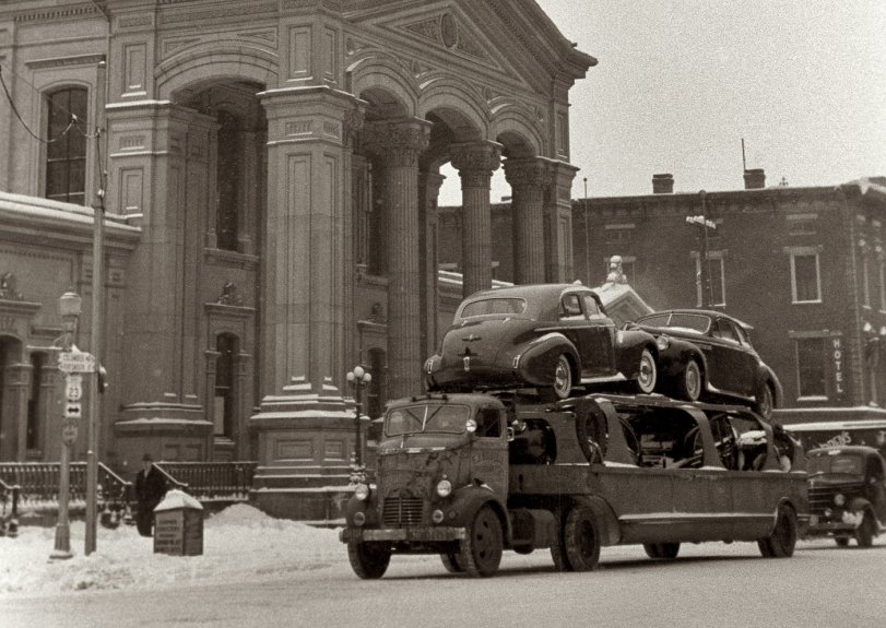 February 1940. Courthouse and auto transport carrying Buicks in Chillicothe, Ohio. View full size. 35mm nitrate negative by Arthur Rothstein for the FSA.
