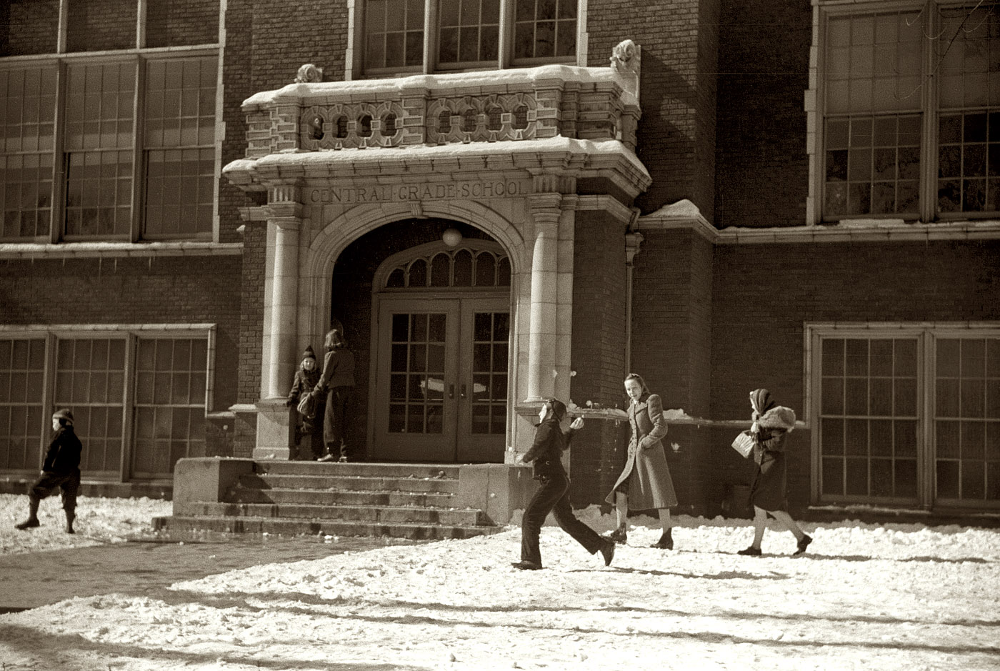 February 1940. The snowballs fly at Central Grade School in Chillicothe, Ohio. View full size. 35mm nitrate negative by Arthur Rothstein for the FSA.