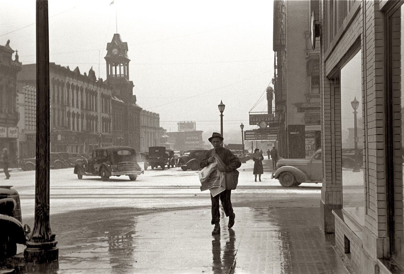 February 1940. Newsboy during a winter storm in Iowa City, Iowa. 35mm nitrate negative by Arthur Rothstein, Farm Security Administration. View full size. Our readers point out the Englert Theater to the right, where "Balalaika" is playing.