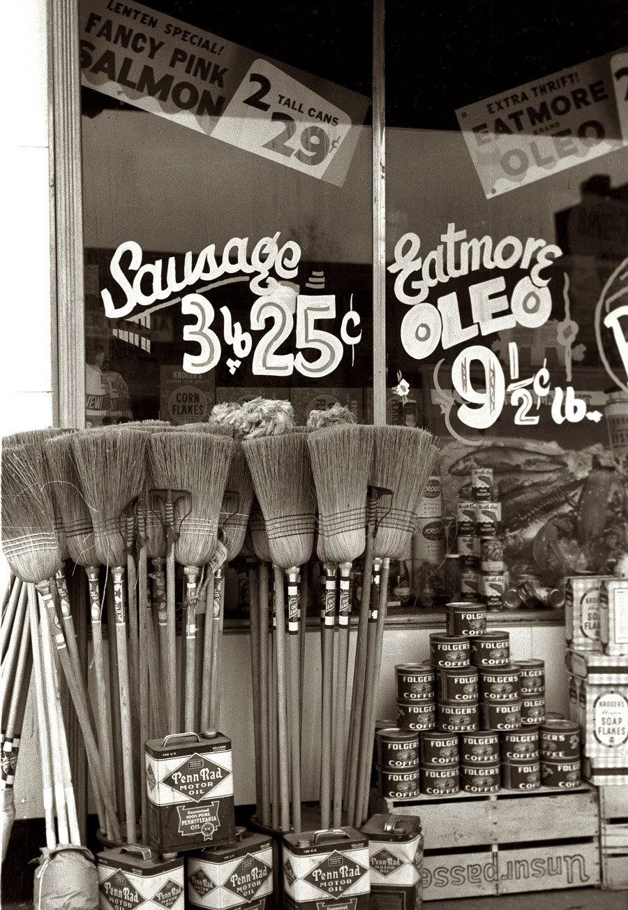 February 1940. A grocery store window in Salem, Illinois. View full size. 35mm nitrate negative by Arthur Rothstein for the Farm Security Administration.