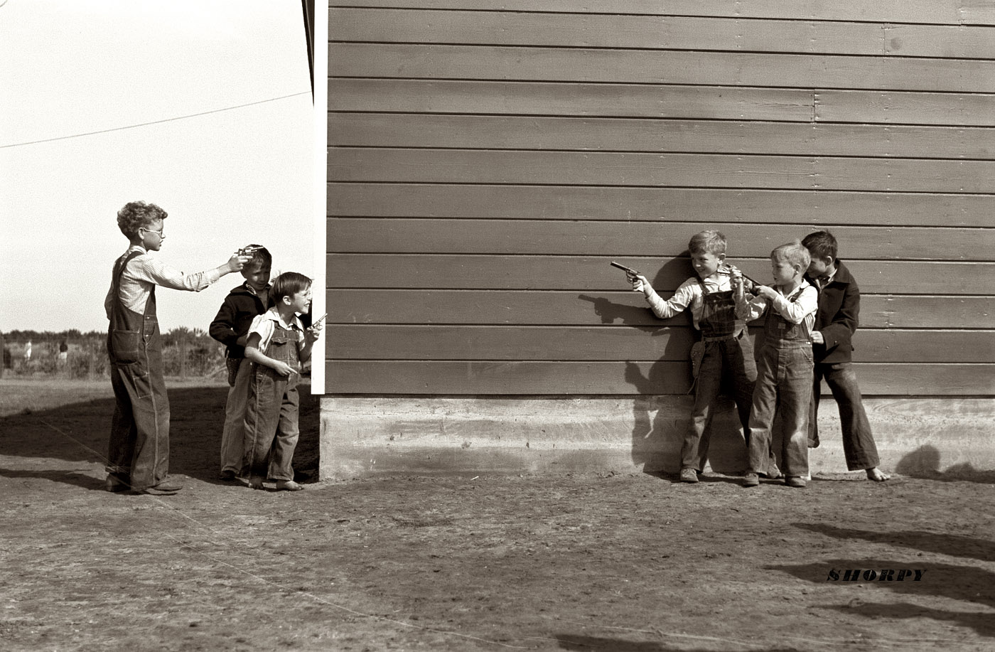 January 1942. "Cowboys and Indians" at the Farm Security Administration camp elementary school in Weslaco, Tex. View full size. Photo by Arthur Rothstein.