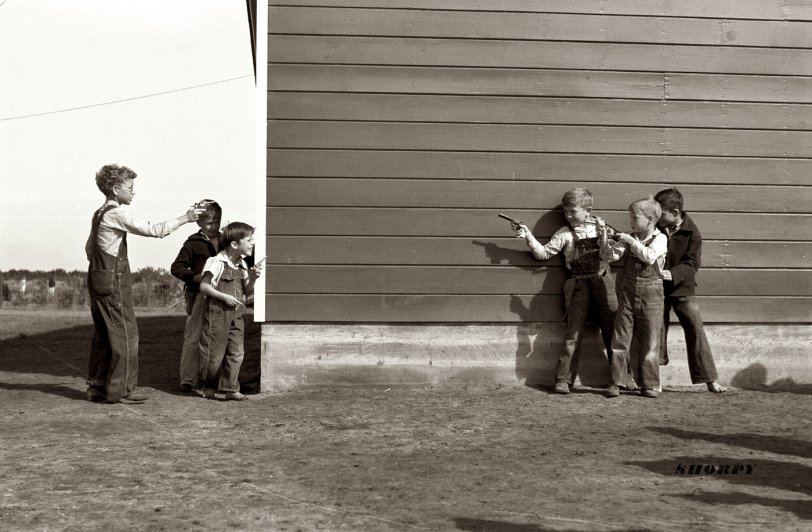 January 1942. "Cowboys and Indians" at the Farm Security Administration camp elementary school in Weslaco, Tex. View full size. Photo by Arthur Rothstein.
