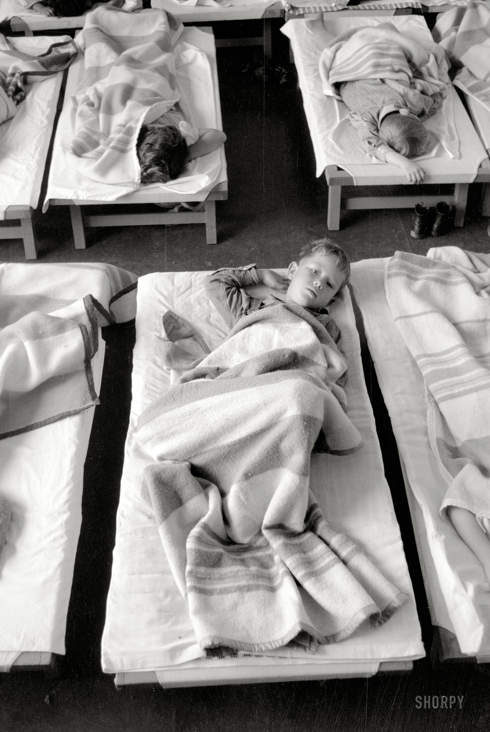 February 1942. "Midday nap. Nursery school of Farm Security Administration camp at Harlingen, Texas." 35mm negative by Arthur Rothstein. View full size. 