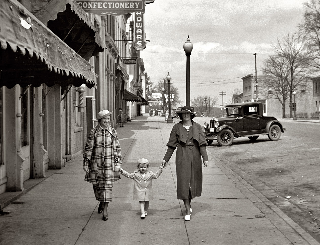 April 1936. Three ladies out and about in Jackson, Ohio. View full size. 35mm nitrate negative by Theodor Jung for the Farm Security Administration.