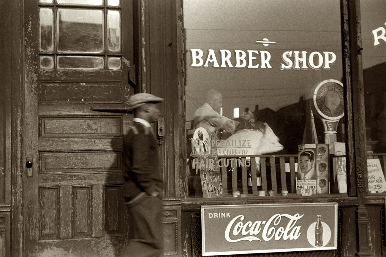 April 1941. South Side Chicago. "Barber shop in the Black Belt." View full size. 35mm safety negative by Edwin Rosskam for the Farm Security Administration.