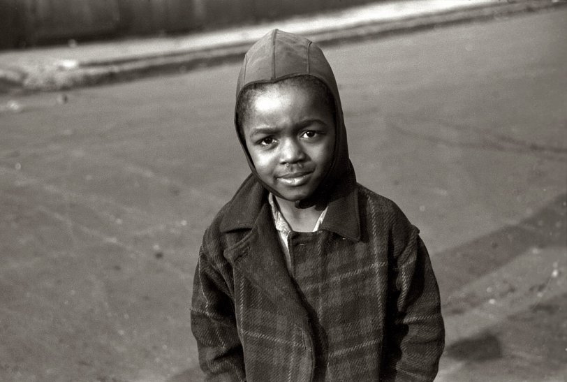 April 1941. "Street urchin, Black Belt, Chicago." Also seen here. 35mm negative by Edwin Rosskam for the Farm Security Administration. View full size.
