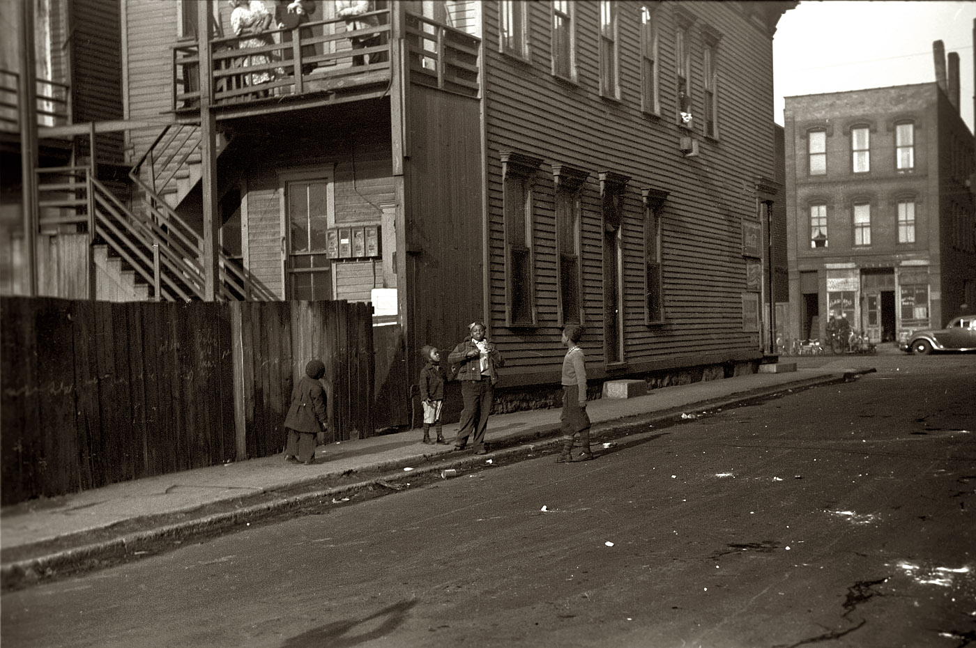 April 1941. Street scene in the Black Belt, South Side Chicago. View full size. 35mm nitrate negative by Edwin Rosskam for the Farm Security Administration.