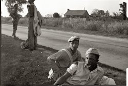 October 1935. Cotton pickers in Pulaski County, Arkansas. View full size. 35mm nitrate negative by Ben Shahn for the Farm Security Administration.