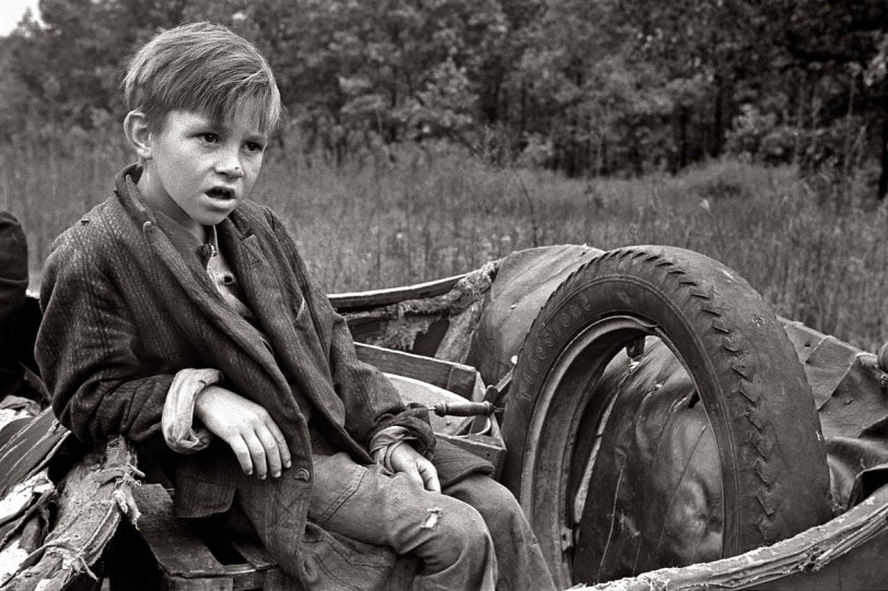 October 1935. Son of destitute Ozark family on the road in Arkansas. 35mm nitrate negative by Ben Shahn, Farm Security Administration. View full size.
