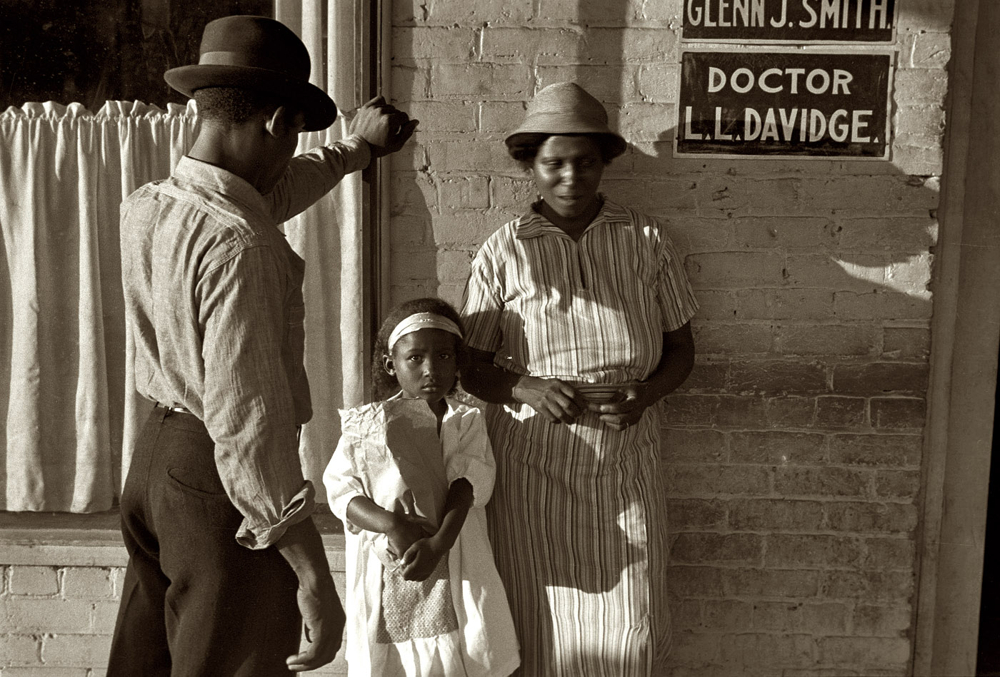 October 1935. "Residents of Amite City, Louisiana." View full size. 35mm nitrate negative by Ben Shahn for the Farm Security Administration.