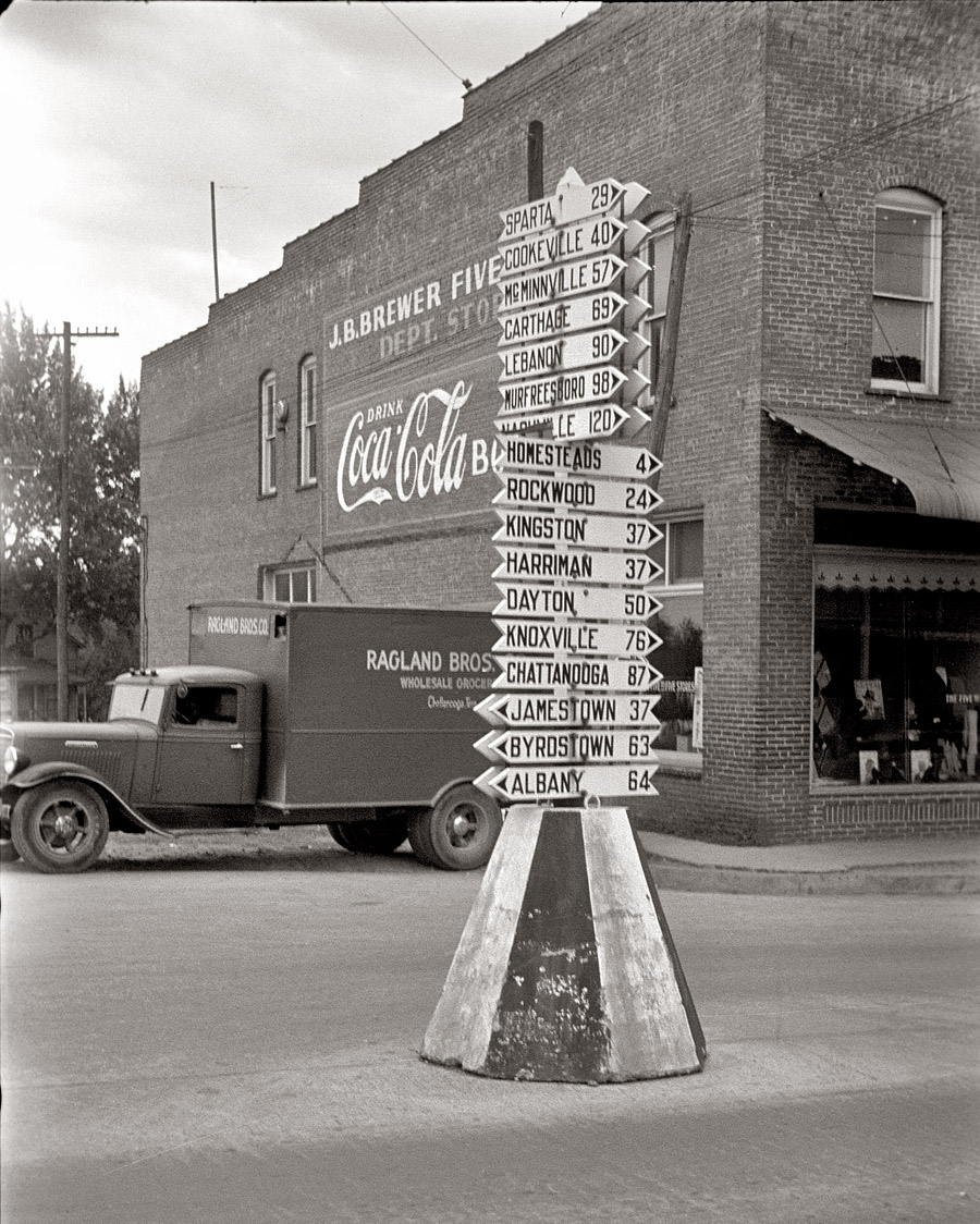 1937. Signpost in the aptly named Tennessee town of Crossville. View full size. Photograph by Ben Shahn.