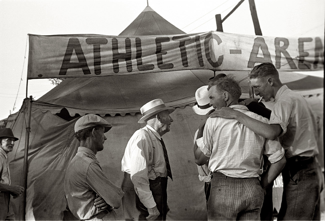 July 1938. Ashville, Ohio. "Wrestling matches at the Fourth of July celebration." View full size.  35mm nitrate negative by Ben Shahn for the FSA.