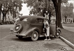 Summer 1938. Saturday afternoon shopping in London, Ohio. View full size. 35mm nitrate negative by Ben Shahn for the Farm Security Administration.