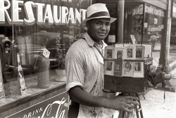 August 1938. "Itinerant photographer in Columbus, Ohio." View full size. 35mm nitrate negative. Photograph by Ben Shahn, Farm Security Administration.