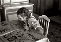 December 1936. "Daughter reading Sunday paper at the Rustan Brothers farm near Dickens, Iowa. Two hundred forty acres, crop share lease, owned by Metropolitan Life." View full size. 35mm nitrate negative by Russell Lee.