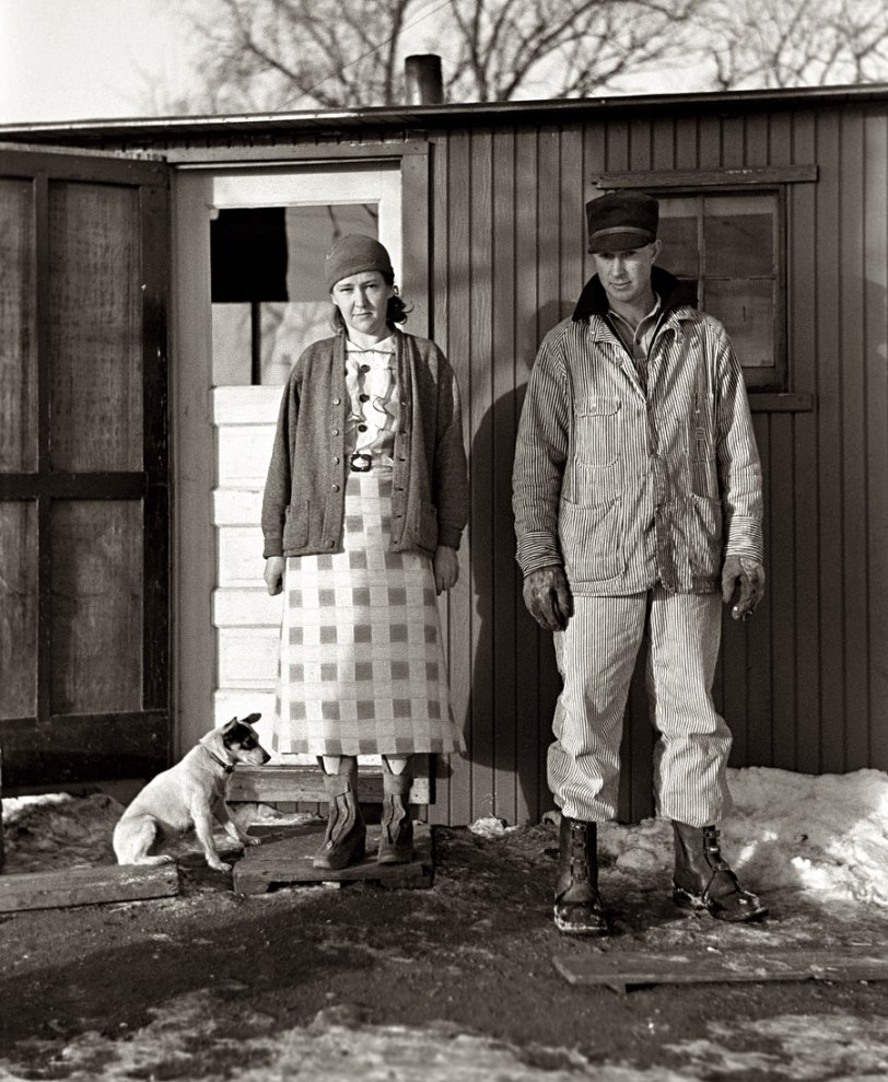 December 1936. "Mr. and Mrs. Marcus Miller and dog. Spencer, Iowa." 35mm negative by Russell Lee for the Resettlement Administration. View full size.