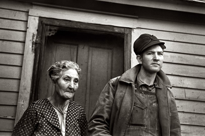 December 1936. Woodbury County, Iowa. "Mrs. Mary Kelsheimer and one of her sons on a tenant farm in Miller Township." View full size. 35mm nitrate negative by Russell Lee for the Resettlement Administration.