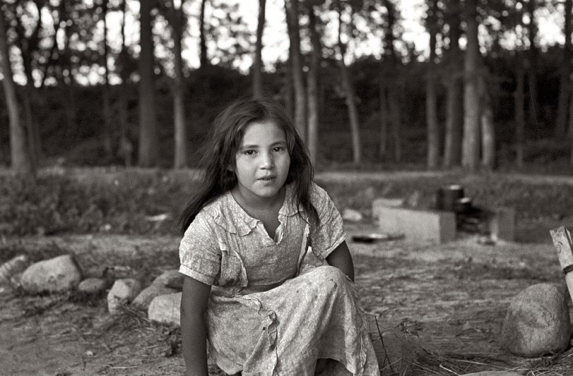 August 1937. "Indian girl, daughter of blueberry picker, near Little Fork, Minnesota." View full size. 35mm nitrate negative by Russell Lee for the FSA.