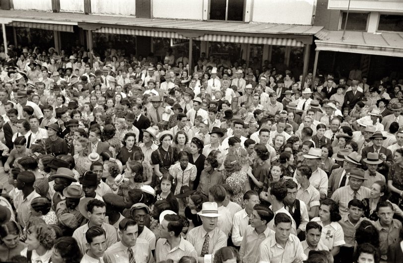 October 1938. Crowley, Louisiana. "Crowd of people waiting for Cajun band contest to begin at the National Rice Festival." View full size. 35mm nitrate negative by Russell Lee for the Farm Security Administration.