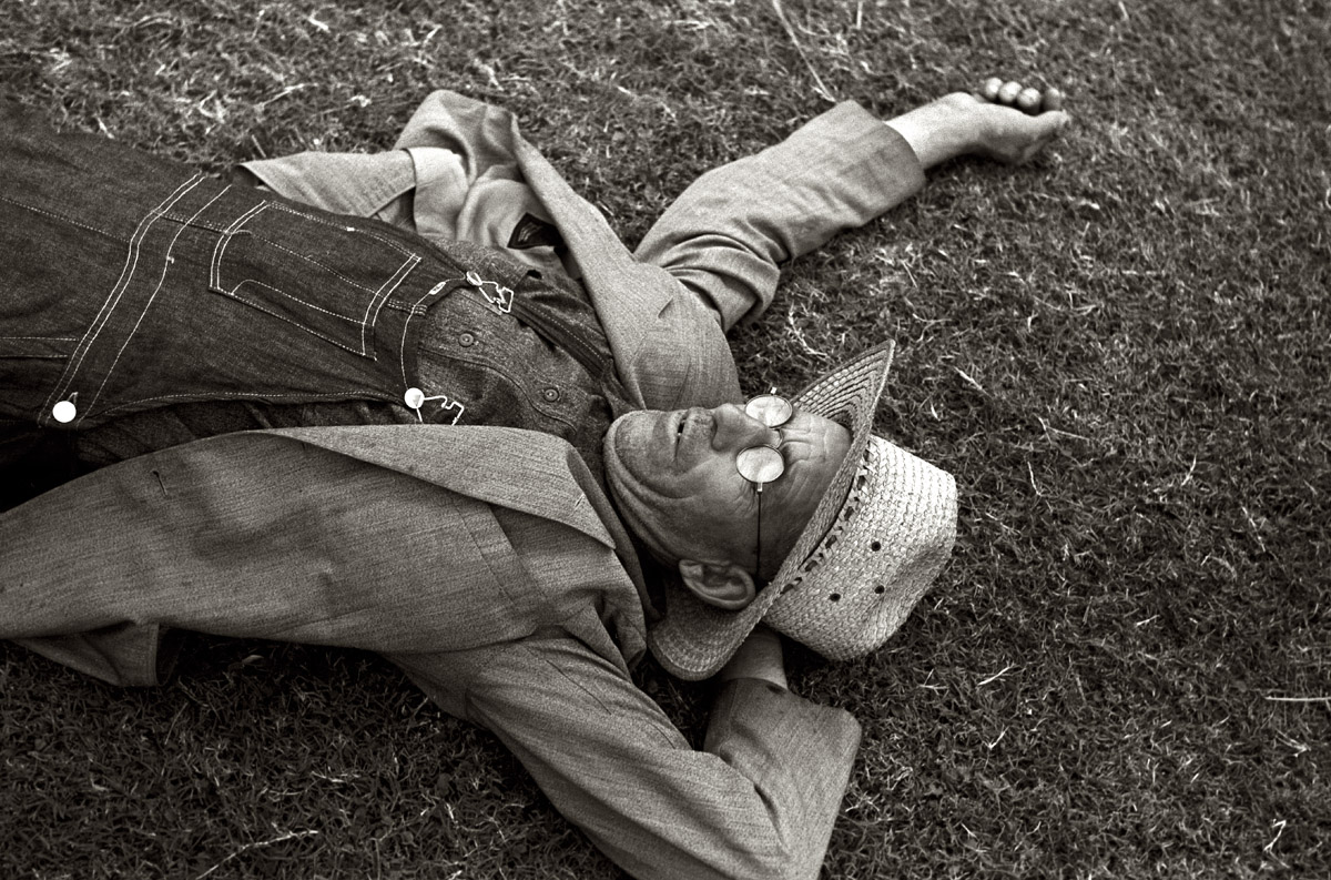 October 1938. "Farmer at the National Rice Festival taking a rest. Crowley, Louisiana." View full size. 35mm nitrate negative by Russell Lee for the FSA.