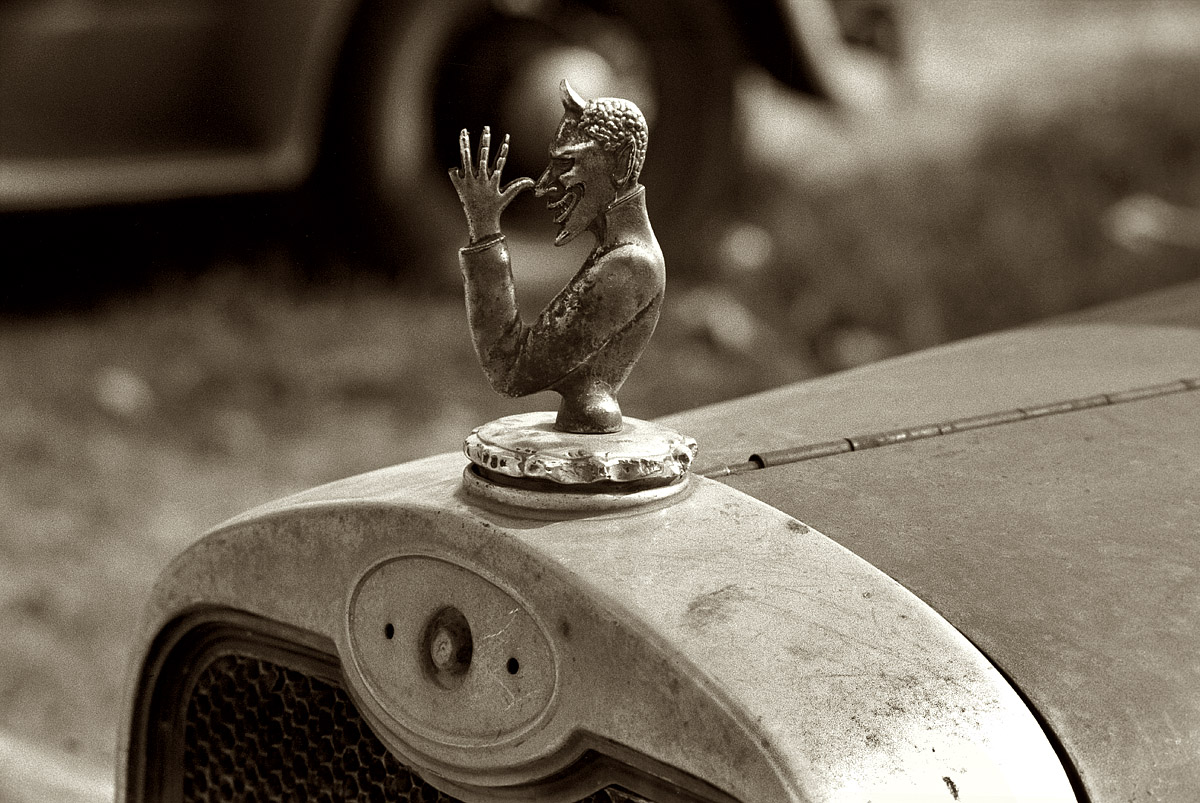 November 1938. "Radiator cap. Laurel, Mississippi." View full size. 35mm nitrate negative by Russell Lee for the Farm Security Administration.