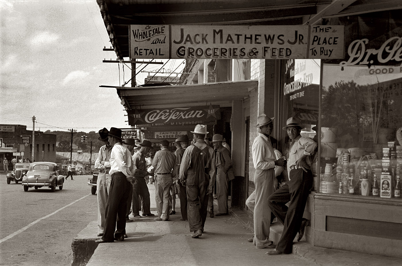April 1939. Street scene in San Augustine, Texas. View full size. 35mm nitrate negative by Russell Lee for the Farm Security Administration.