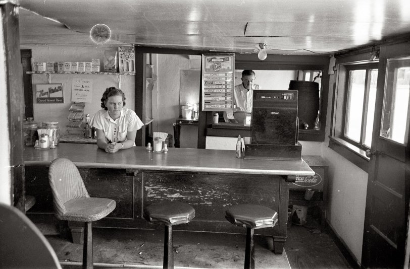 May 1939. "Interior of hamburger stand. Waiting for customer. Alpine, Texas." View full size. 35mm negative by Russell Lee, Farm Security Administration.