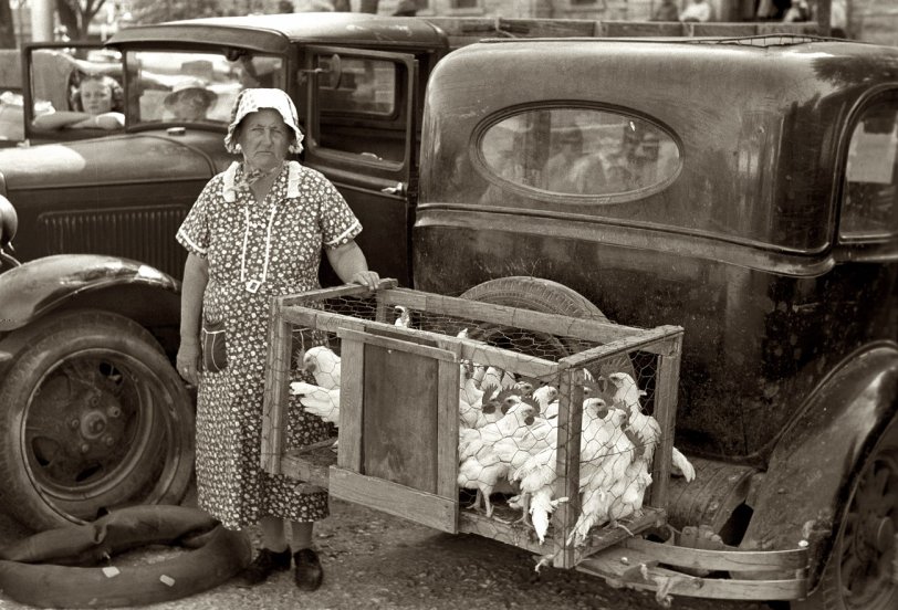 May 1939. "Farm woman. Vendor of chickens at farmers' market in Weatherford, Texas." 35mm nitrate negative by Russell Lee for the FSA. View full size.