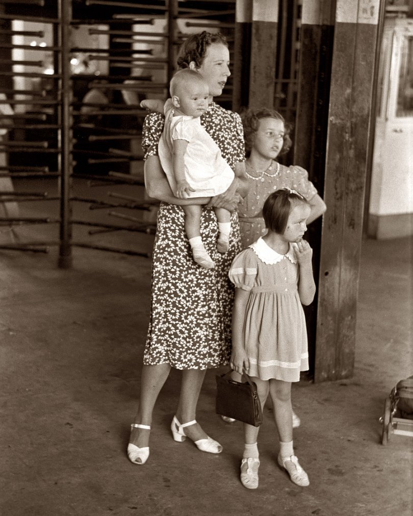 July 1939. "Woman with children at streetcar terminal in Oklahoma City." 35mm nitrate negative by Russell Lee, Farm Security Administration. View full size.
