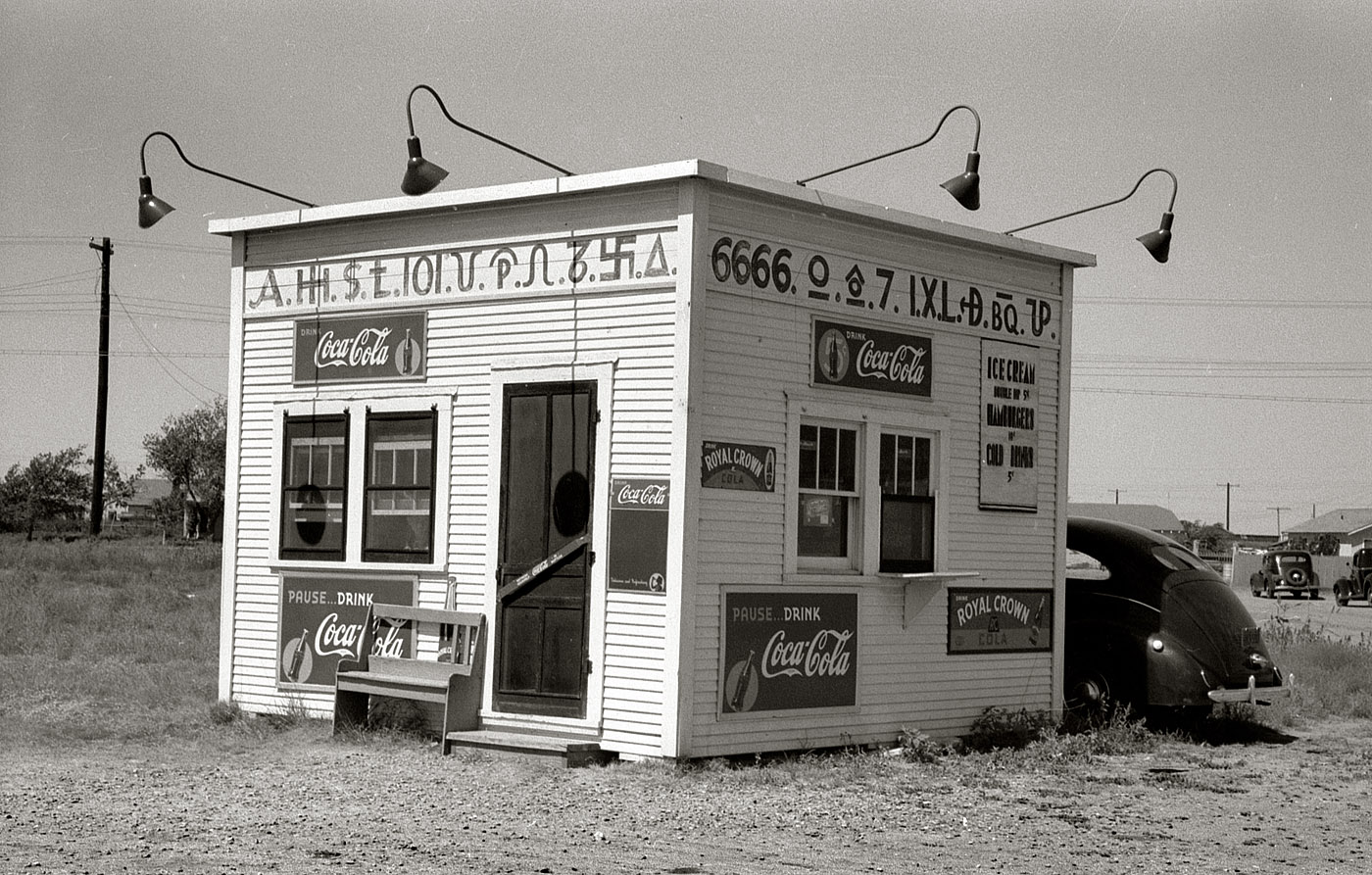 September 1939. "Hamburger stand with old cattle brands. Dumas, Texas." 35mm negative by Russell Lee for the Farm Security Administration. View full size.