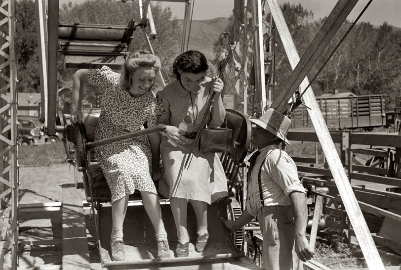July 1941. Girls at the Fourth of July carnival in Vale, Oregon. View full size. 35mm nitrate negative by Russell Lee for the Farm Security Administration.
