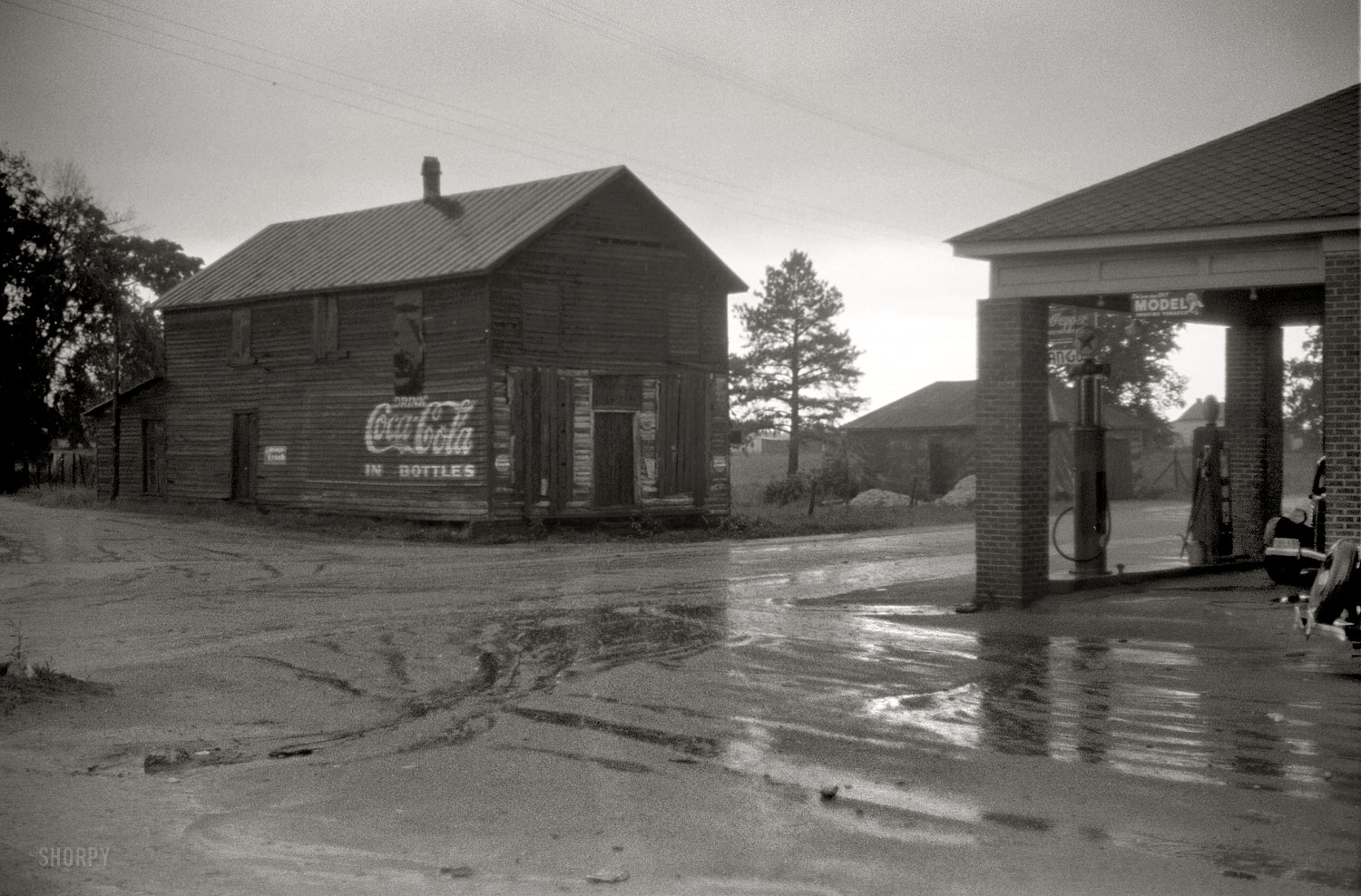 May 1940. Stem, North Carolina. "Crossroads garage and store." 35mm nitrate negative by Jack Delano for the Resettlement Administration. View full size.