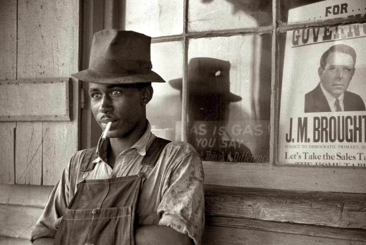 May 1940. "Young Negro farm laborer. Stem, North Carolina." View full size. 35mm nitrate negative by Jack Delano for the Farm Security Administration.