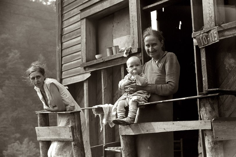 September 1938. "Mother, wife and child of unemployed coal miner. Marine, West Virginia." View full size. 35mm negative by Marion Post Wolcott for the FSA.
