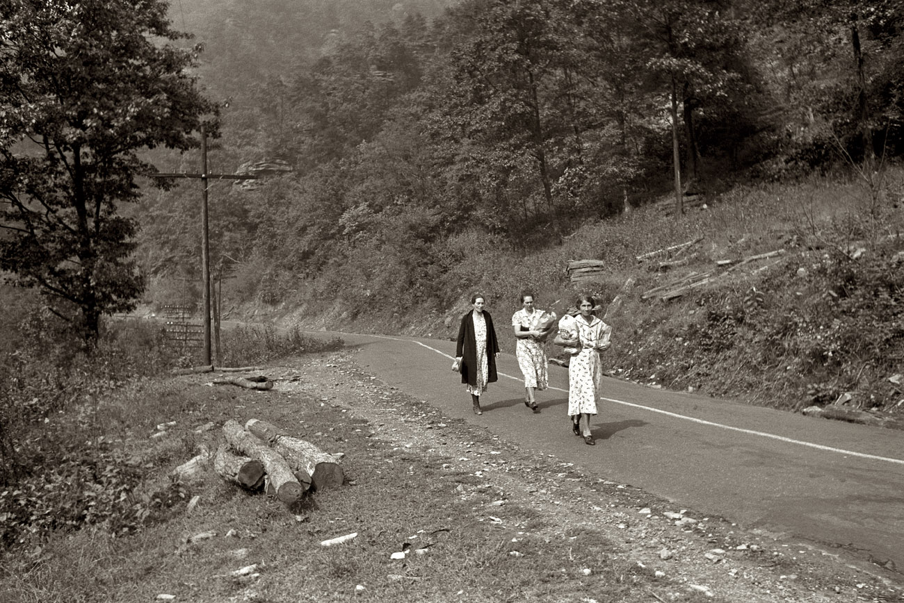 September 1938. "Miners' wives coming home from town with groceries on payday near Mohegan, West Virginia." View full size. 35mm nitrate negative by Marion Post Wolcott for the Farm Security Administration.