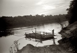 May 1939. "Old cable ferry between Camden and Gee's Bend, Alabama." 35mm negative by Marion Post Wolcott, Farm Security Administration. View full size.