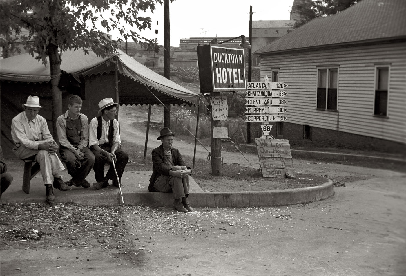 October 1939. "Copper miners on strike waiting for scabs to come out of the mines. Ducktown, Tennessee." View full size. 35mm nitrate negative by Marion Post Wolcott for the Farm Security Administration.