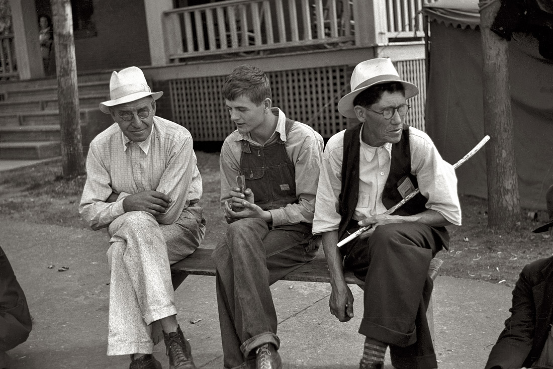 October 1939. "Picketing. Copper miners on strike waiting for scabs to come out of the mines. Ducktown, Tennessee." View full size. 35mm nitrate negative by Marion Post Wolcott for the Farm Security Administration.