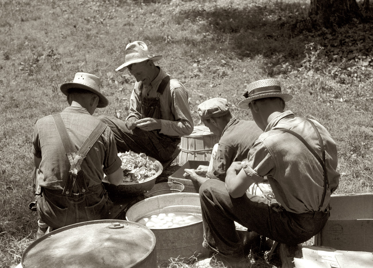 August 1940 near Bardstown, Kentucky. "Parishioners peeling potatoes for a benefit picnic supper on the grounds of St. Thomas Church." View full size. 35mm negative by Marion Post Wolcott for the Farm Security Administration.
