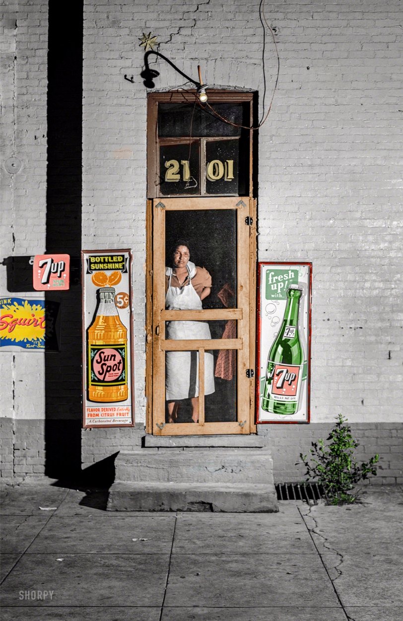 Colorized from this Shorpy original. I tried to get the colors of the soda signs correct by checking online auctions with photos. View full size.
