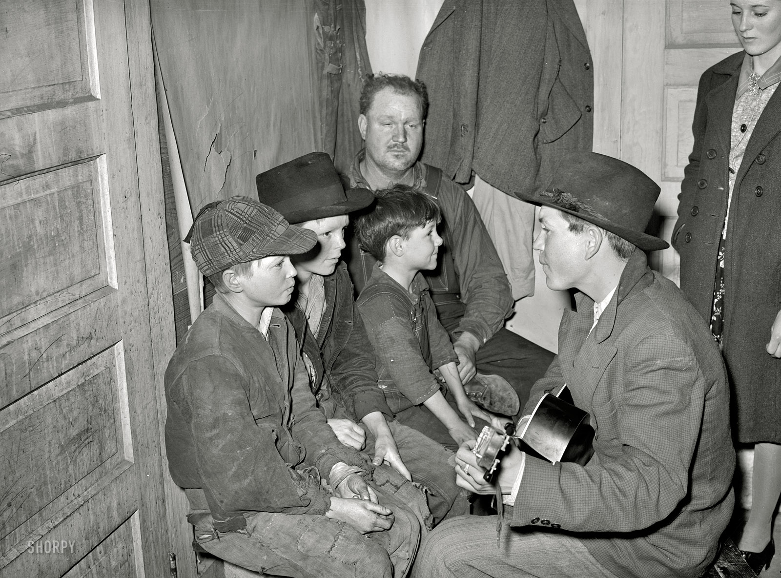 February 1940. "Farm boys at play party in McIntosh County, Oklahoma." Safety negative by Russell Lee for the Farm Security Administration. View full size.