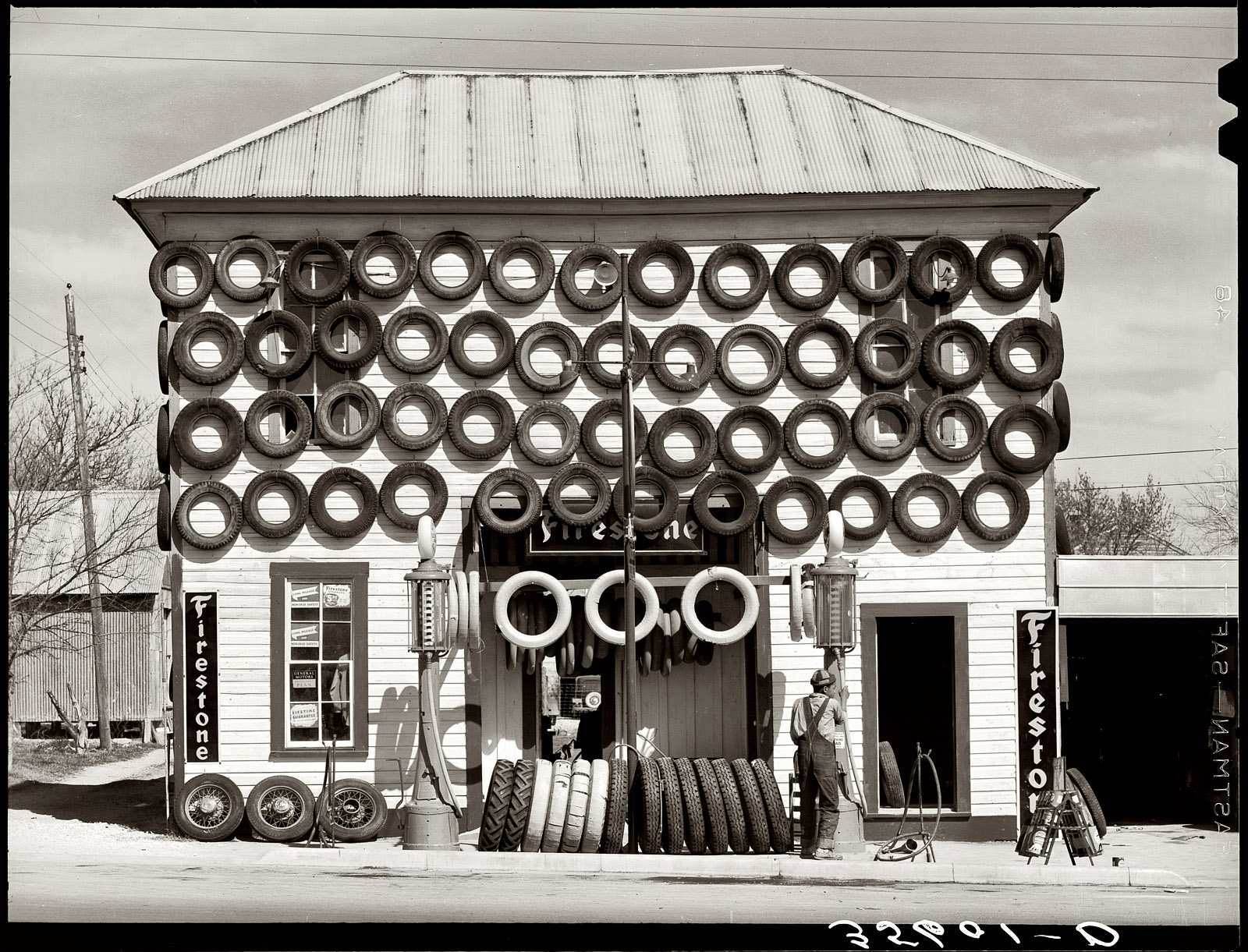 March 1940. "Secondhand tires for sale at a gas station in San Marcos, Texas." Medium-format safety negative by Russell Lee for the FSA. View full size.